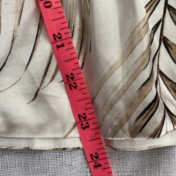 White House Black Market silky peplum blouse. - Picture 14 of 14